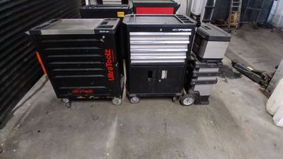 a lot of tools that are sitting on the floor