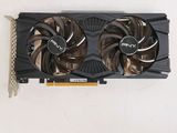 a close up of a video card with two fans on top of it