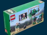 a box of legos with a picture of a man on a bench