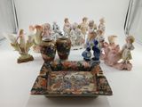 a lot of figurines that are sitting on a table
