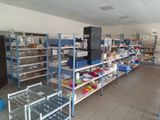 a large room with many shelves and shelves filled with food