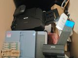 many different types of printer and other things in this room