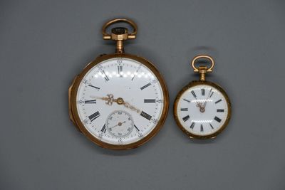 une image représentant deux horloges posées l'une à côté de l'autre sur une table