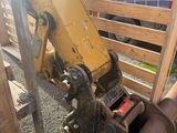 a large yellow machine that is sitting on the ground