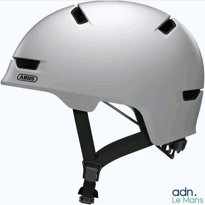 an image of a white helmet with black buttons on the side