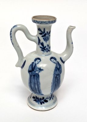 a blue and white vase with two people on it