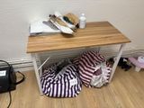 a small table with a bag on top of it