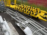 a lot of construction equipment that is sitting on the ground