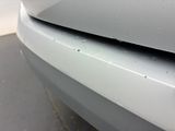 a close up of the front bumper of a car