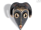 an image of a black mask with a heart shaped face