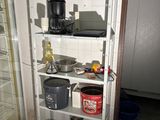 a refrigerator with many items on it in a kitchen