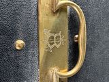a close up of a metal handle on a suitcase