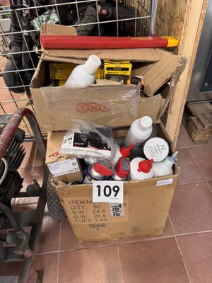 a box full of assorted items sitting on the floor