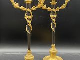 paire de candélabres anciens en laiton avec fleurs et feuilles