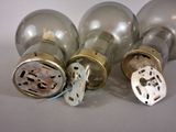 three bulbs that are sitting on a table
