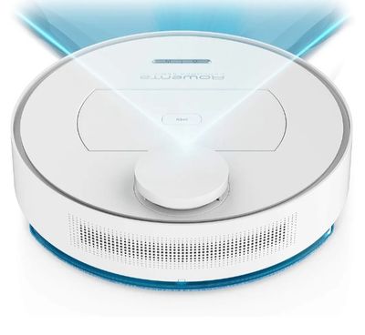 un gros plan d'un robot blanc et bleu posé sur une surface blanche
