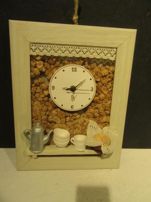 a picture of a picture of a clock made out of cereal