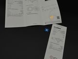 un dé bleu posé sur une table, à côté de quelques feuilles de papier