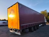 an image of a semi truck parked in a parking lot