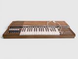 a close up of an electronic keyboard on a white surface