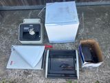 a microwave, a microwave oven, a toaster oven, and a toaster oven sitting on the ground