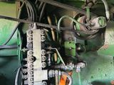 a close up of a machine that is on the ground