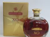 an image of a bottle of perfume sitting next to a box