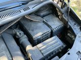 the engine compartment of a car with the hood open