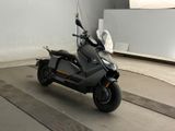 a scooter that is parked in a garage