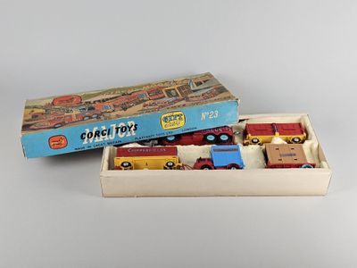 a toy train set in a box on a table