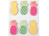 a set of six pineapple shaped cookies on a white background
