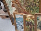 four paintings of trees and a river in a room