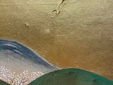 a painting of a bird flying over a hill