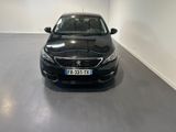 a picture of a black car parked in a garage