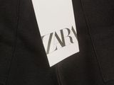 a black hoodie with the logo on it