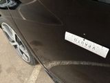an image of a car with a sticker on it