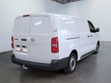 a white van that is parked in a room