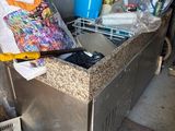 an image of a dirty kitchen with a lot of junk