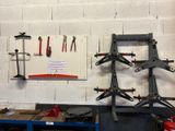 many tools hanging on the wall in the garage