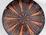 a close up of a plate with a design on it