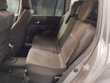 the back seats of a car that is parked in a parking lot