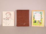 two books on a table with a drawing of a man smoking a pipe and a book with a picture of a man smoking a pipe
