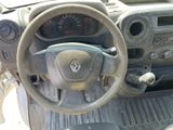 dashboard of a car with a steering wheel and dashboard gauges