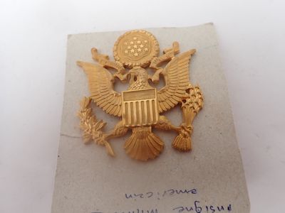 the badge of the united states is displayed on a piece of paper