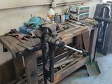 a workbench with tools on it in a garage