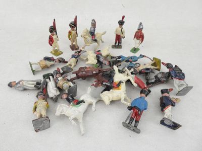 a lot of figurines that are sitting on a table