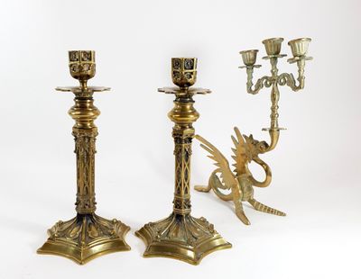 pair of antique brass candlesticks with dragon handles