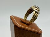 an image of a close up of a ring on top of a wooden box