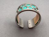 bague en argent massif avec incrustations de turquoise et d'émail vert