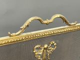a gold frame with a picture of a bird on it